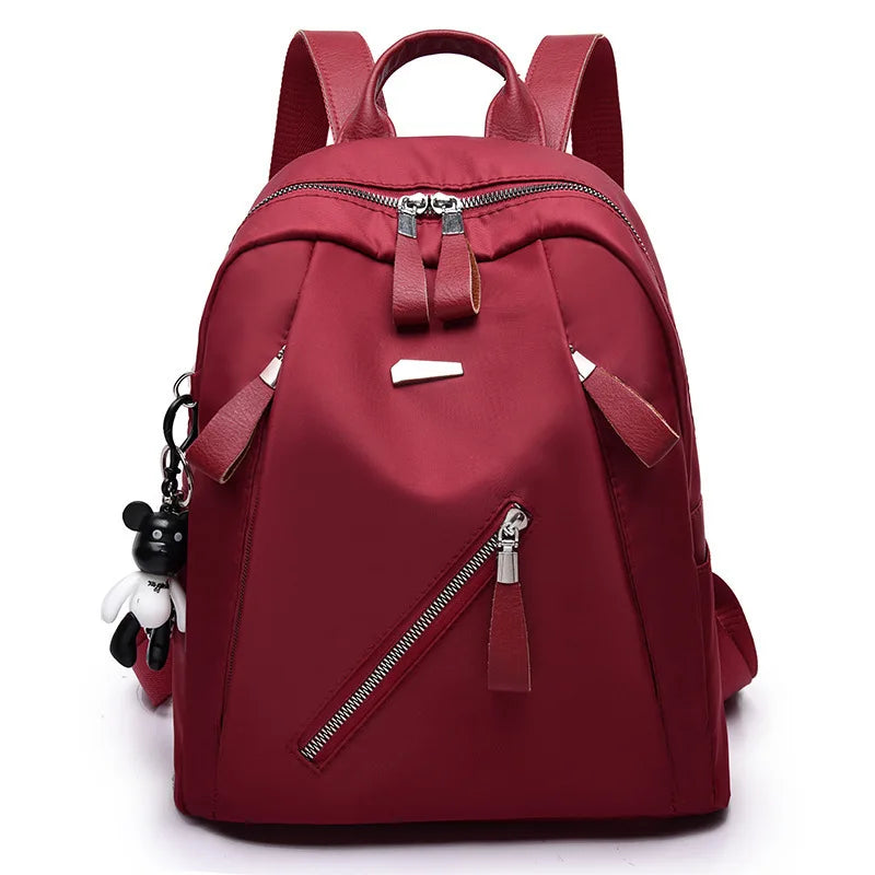 The new Oxford waterproof and wear-resistant travel backpack is simple, versatile and has a large capacity for women