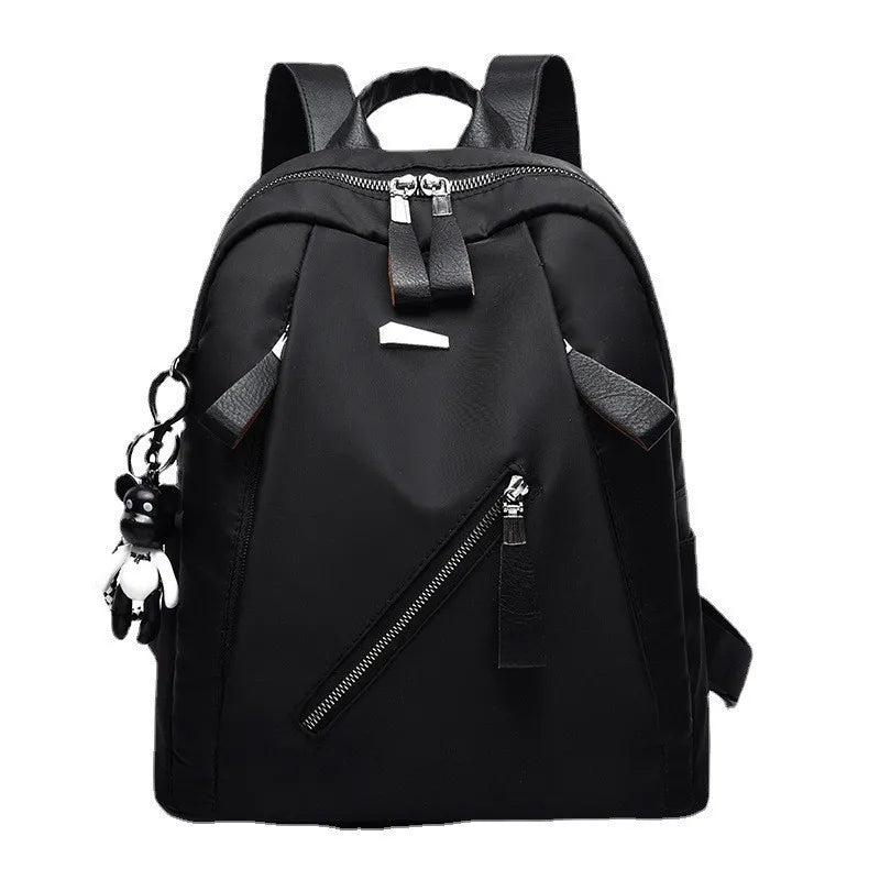 The new Oxford waterproof and wear-resistant travel backpack is simple, versatile and has a large capacity for women