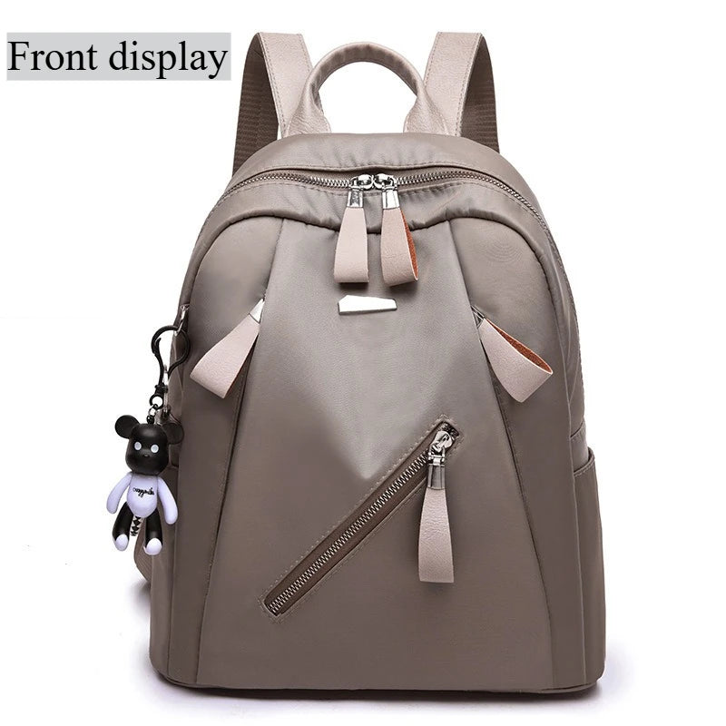 The new Oxford waterproof and wear-resistant travel backpack is simple, versatile and has a large capacity for women